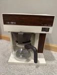 Vintage Mr. Coffee Cb 303A Drip Maker And Floral Glass Pot Wood Grain. Fixed Price $55.00.