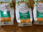 Hazelnut Cr Me Decaffeinated; New England Coffee Brand: Three Bags. Fixed Price $28.00.