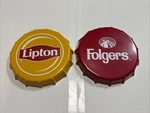 Lot Of 2 Decorative Tin Bottle Cap Folgers And Lipton Cafe Tea Shop. Fixed Price $69.00.