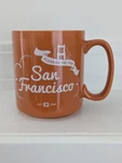 San Francisco Peet's Coffee Orange Mug Bridge Fog Vg+. Fixed Price $19.99.