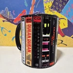 Duran Coffee Mug 11OZ 80S Music Cassette Stack. Fixed Price $28.99.