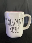 Rae Dunn - Coffee Mug Peppermint Kisses. Fixed Price $16.00.
