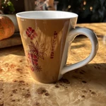 Starbucks Coffee Mug From 2013 Tan White With Red Snowflakes Sun Stars. Fixed Price $7.75.